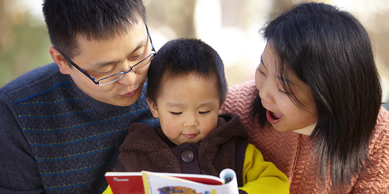 Family reading with preschool child